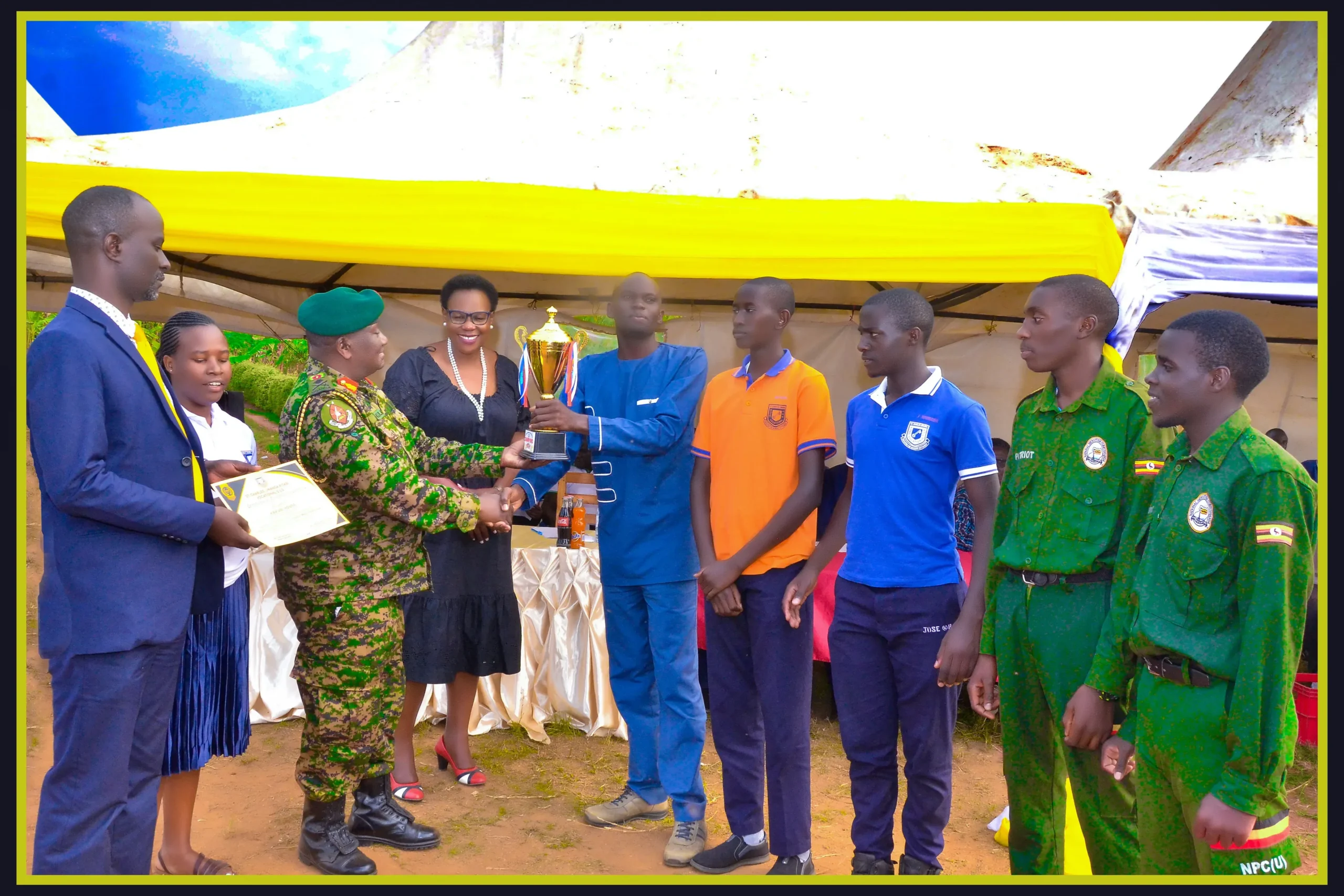 kakubi house receiving the trophy from the chief guest